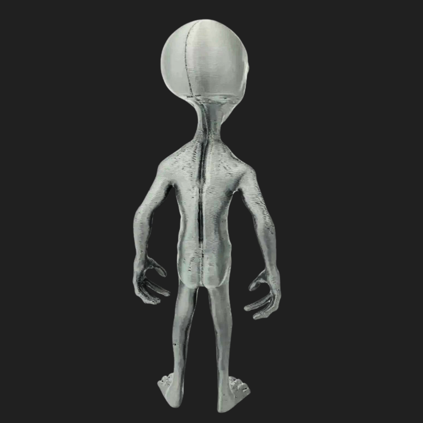 Back view of a 7-inch 3D-printed Grey Visitor alien figurine.