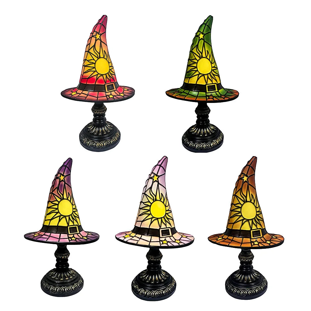Five stained glass witch hat lamps in red, green, orange, pink, and white displayed on white background