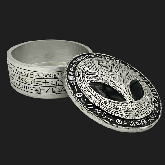 Alien head trinket box with cosmic symbols, lid open showing storage interior, 5 inches wide by 2 inches tall
