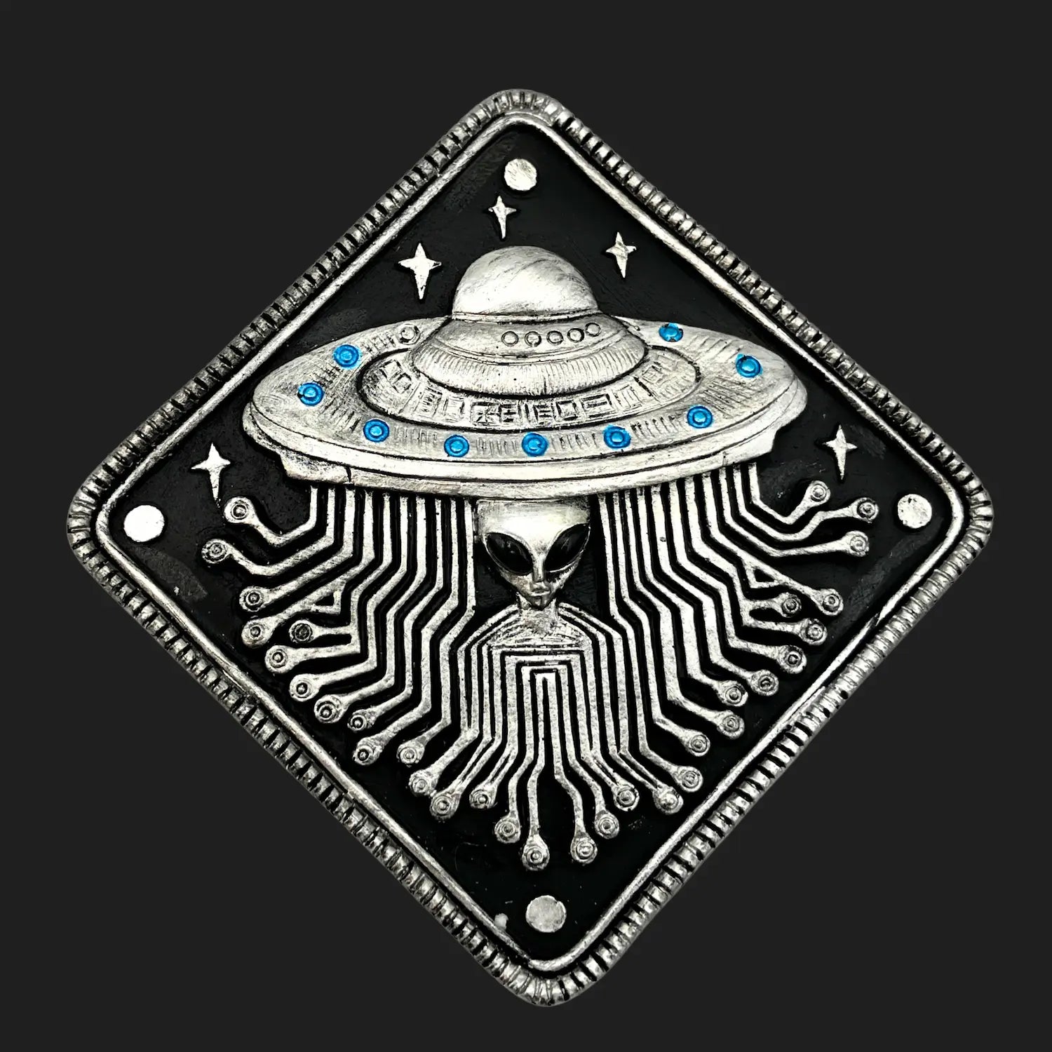 Top view of alien UFO trinket box lid featuring circuit board pattern and extraterrestrial face