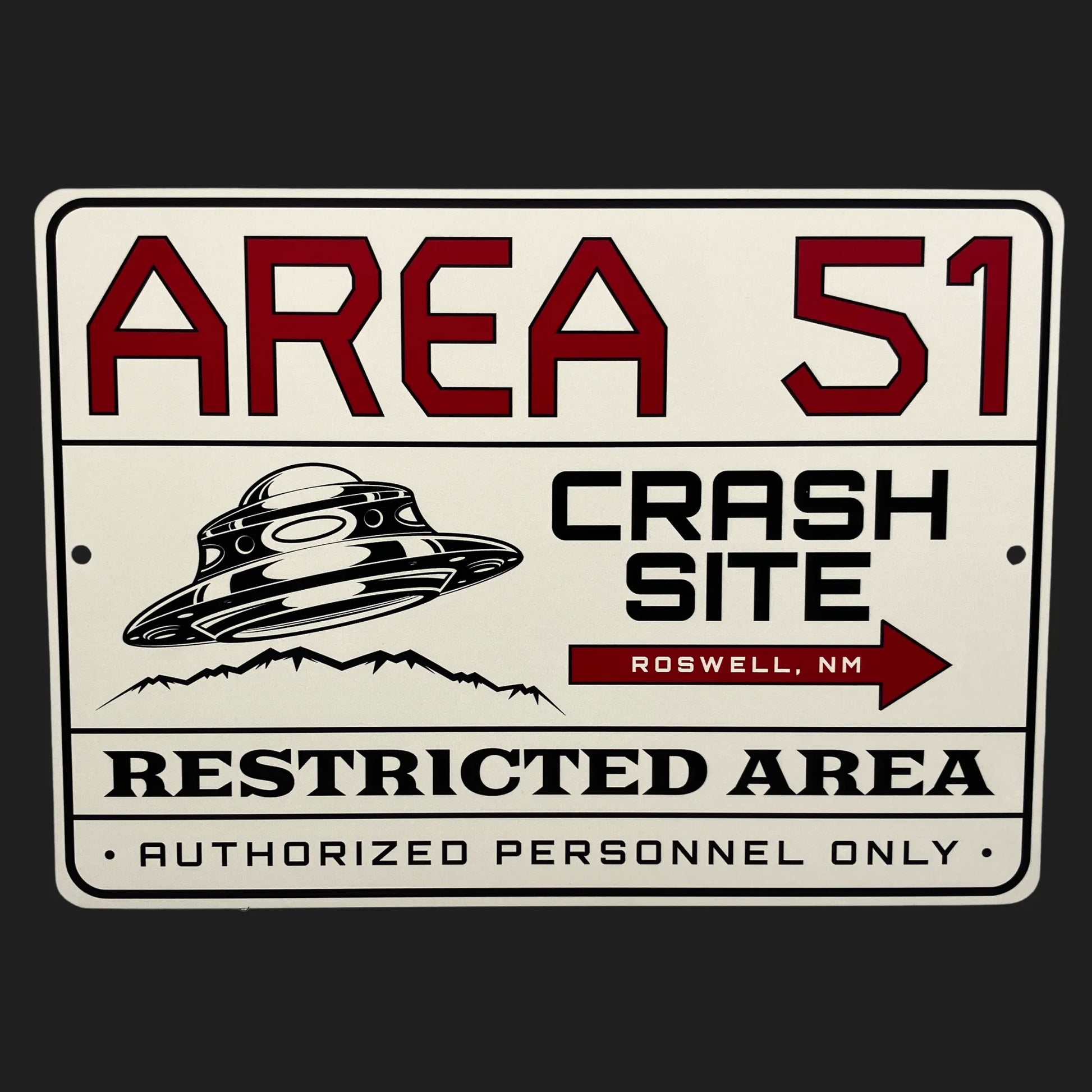 UFO crash site sign with flying saucer graphic blending Roswell and Area 51 legends