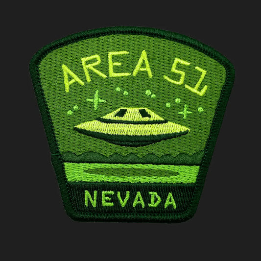Area 51 UFO patch embroidered in green with flying saucer over Nevada desert