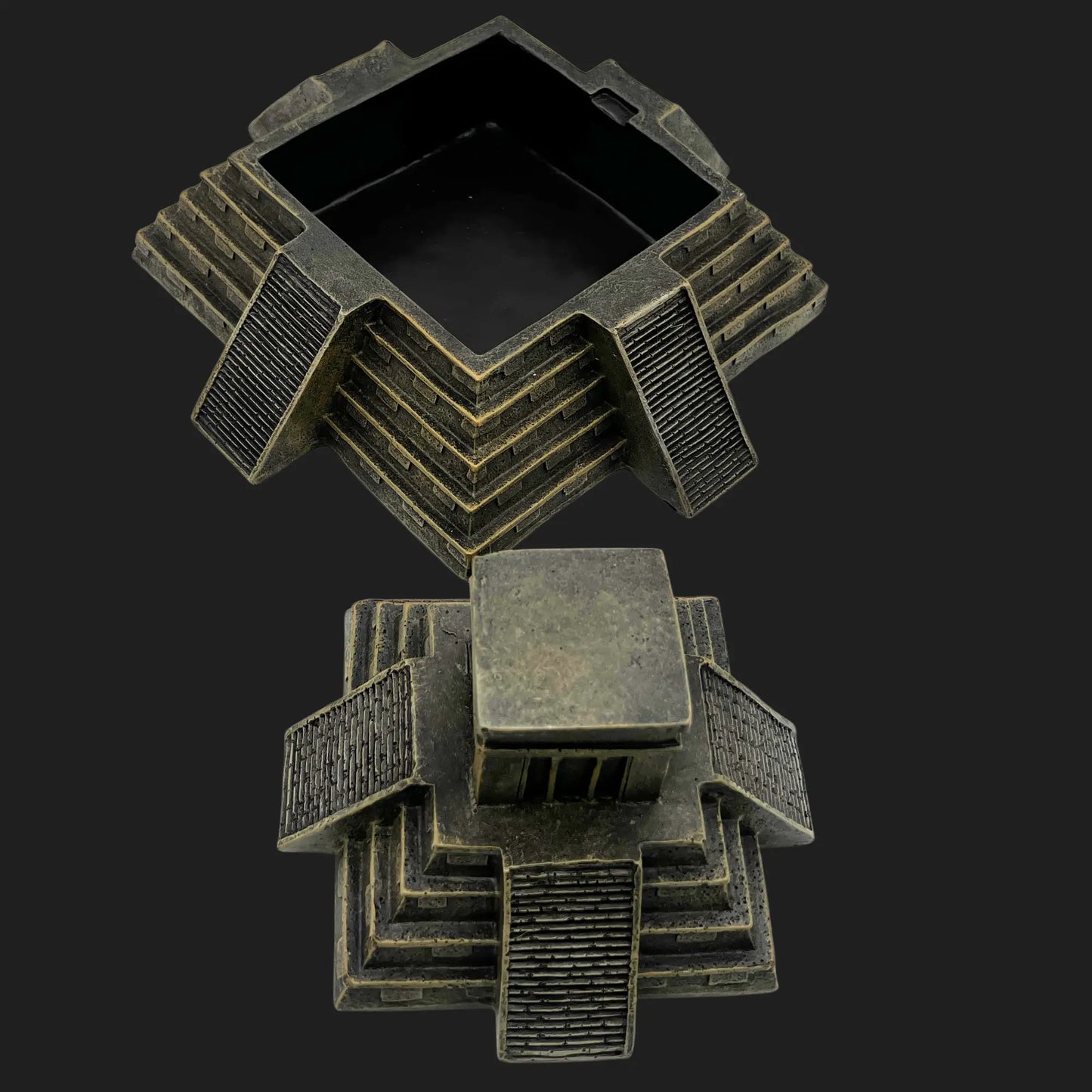 Ancient Aztec pyramid storage box with removable top revealing hidden chamber