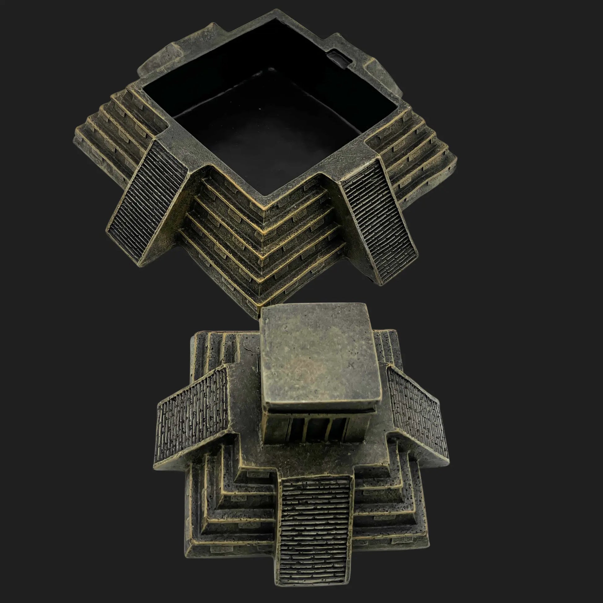 Ancient Aztec pyramid storage box with removable top revealing hidden chamber