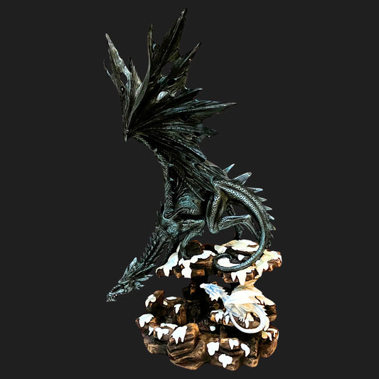 21-inch black dragon statue perched on snowy cliffs with spread wings