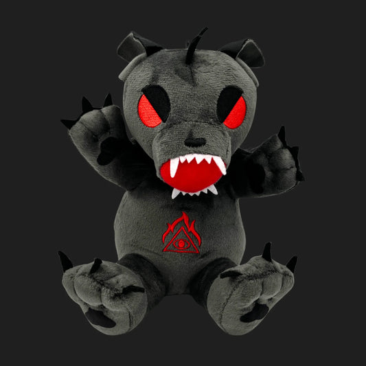 Chupacabra plush toy with glowing red eyes, sharp fangs, and occult symbol on chest — cryptid stuffed animal.