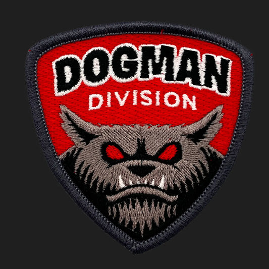Embroidered Dogman Division iron-on patch, 3 x 3 inches, featuring snarling red-eyed werewolf cryptid face on red background.