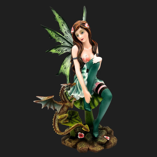 Fairy with green wings sitting on a mushroom with a small dragon coiled at her side – 9.5 inch statue