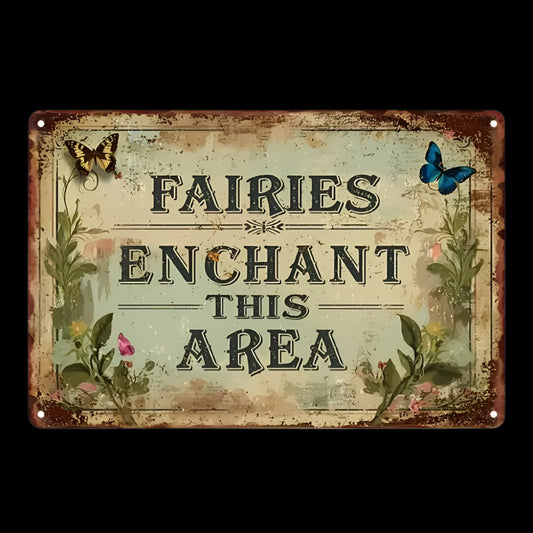 Vintage-style metal sign with floral edges and butterflies, displaying the phrase “Fairies Enchant This Area”