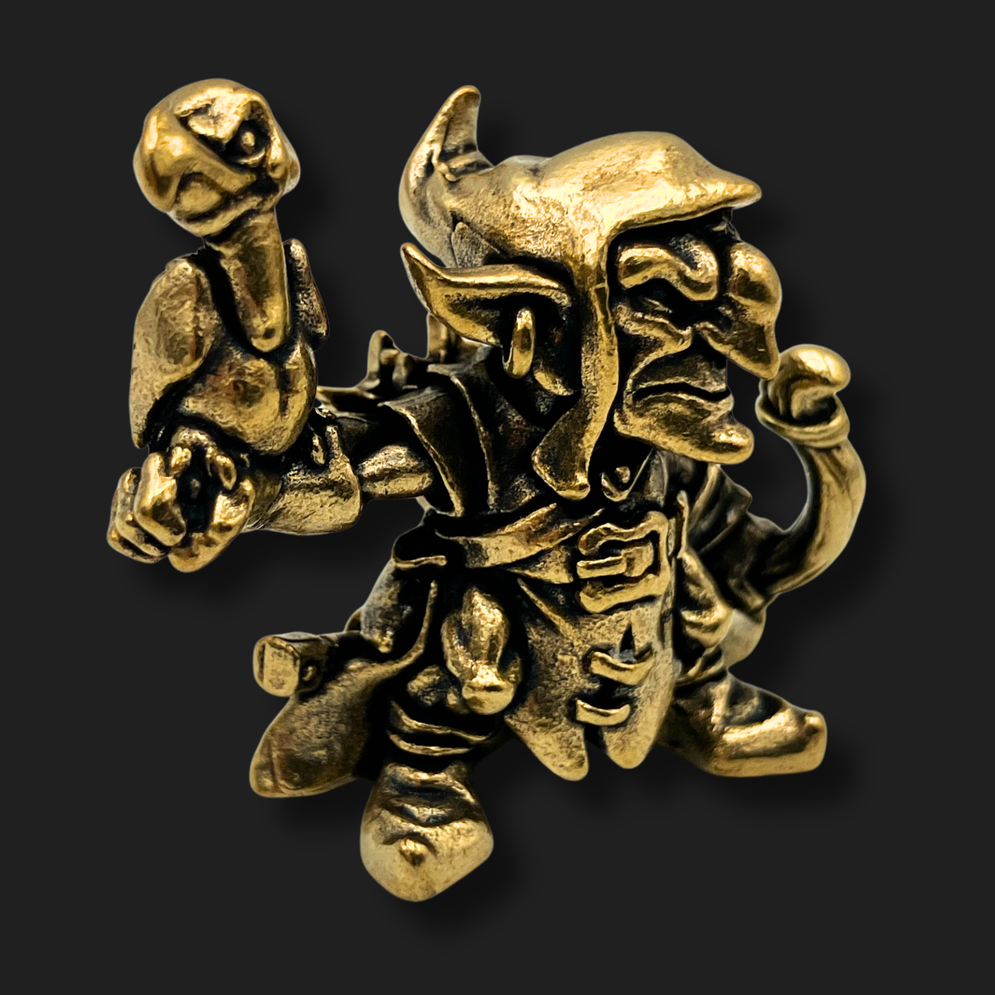 Side angle of bronze goblin falconer figurine with vulture familiar, hand-crafted resin sculpture from Lair of Mythics.