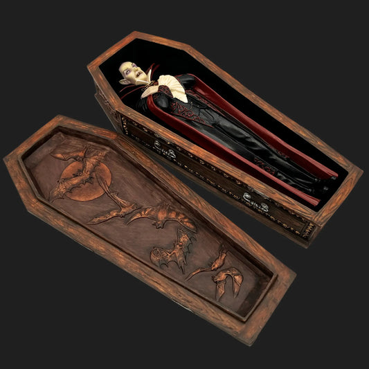 gothic vampire figurine lying in coffin collectible décor