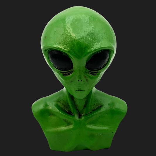 Front view of green alien bust with large black eyes and humanoid chest details