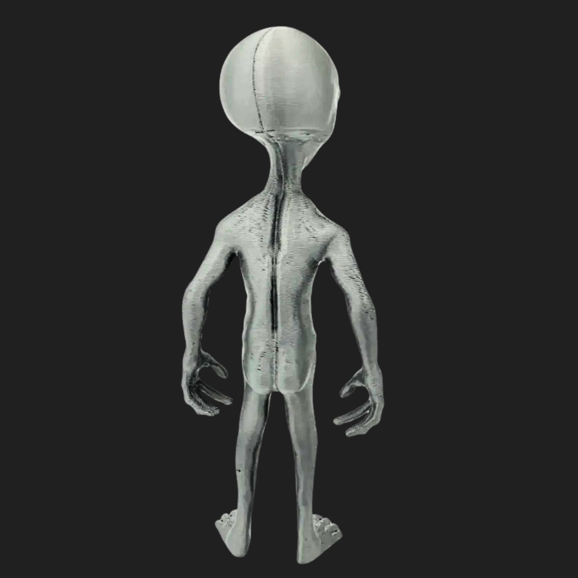 Back view of a 7-inch 3D-printed Grey Visitor alien figurine.