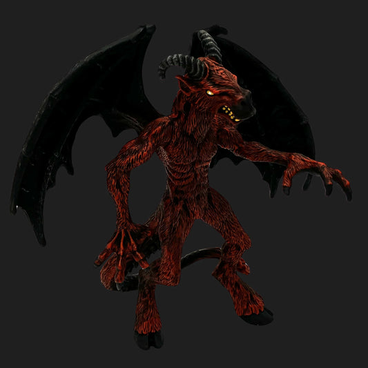Jersey Devil figurine with horns, wings, glowing yellow eyes, and clawed hands.