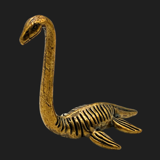 Bronze Loch Ness Monster figurine with elongated neck and flippers.