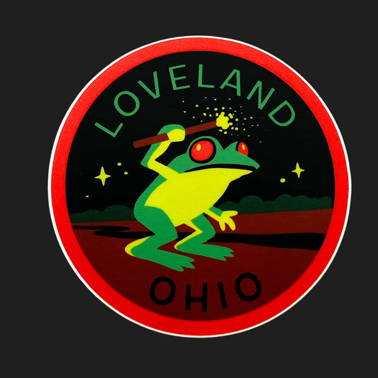 Loveland Frogman sticker with red-eyed amphibian holding a glowing wand, Ohio river cryptid design