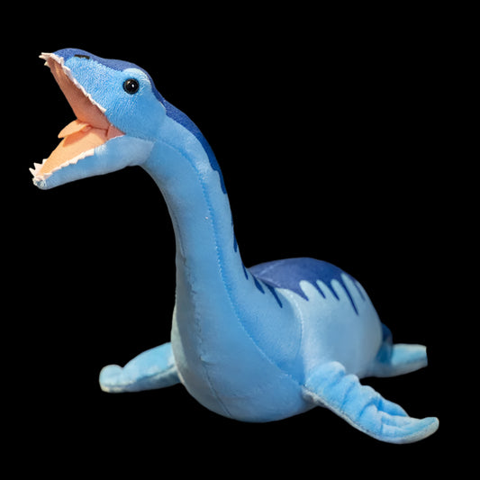 Blue Loch Ness Monster plush toy with open mouth isolated on black background