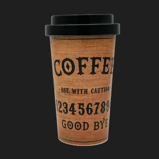 Reusable coffee travel mug with Ouija board lettering and black lid, front view