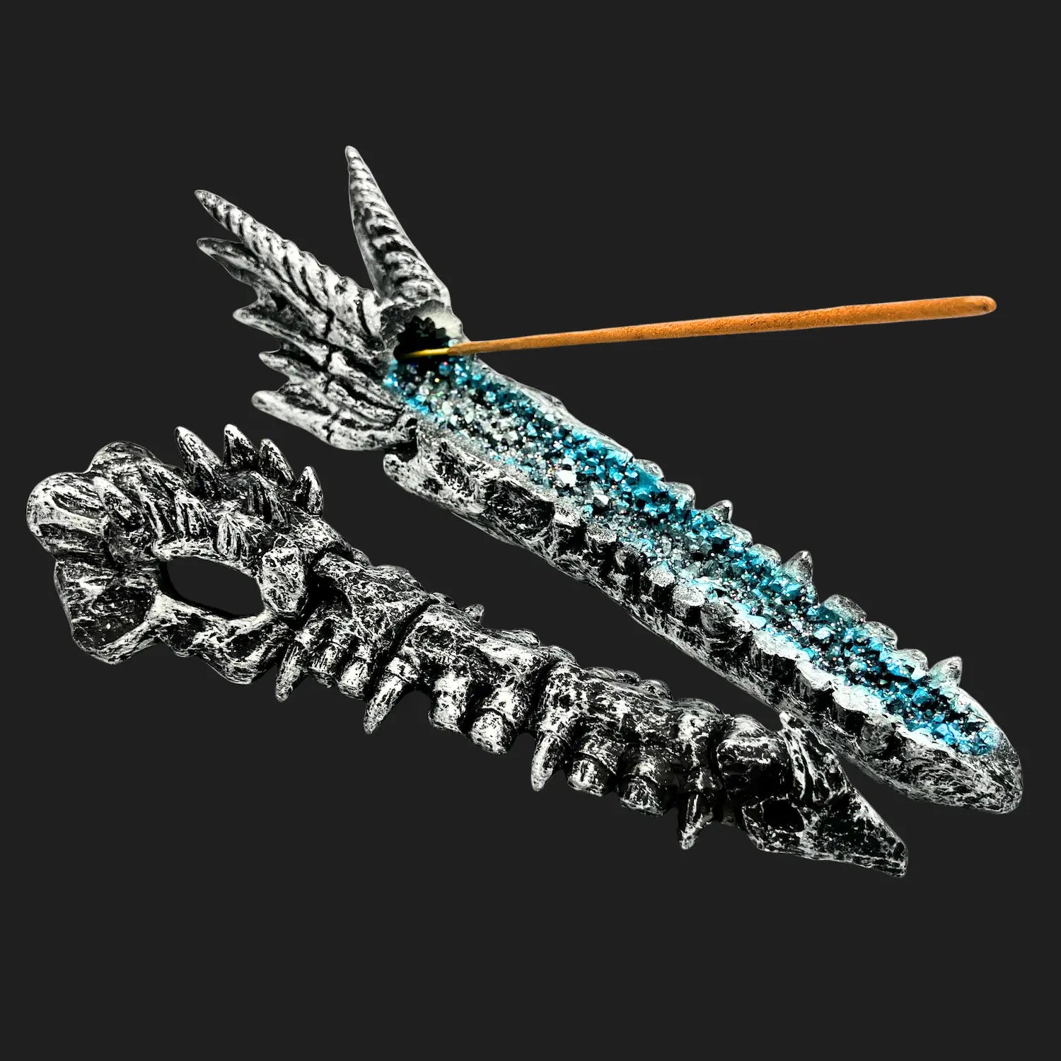 Open silver dragon skull incense burner showing blue crystal ash chamber