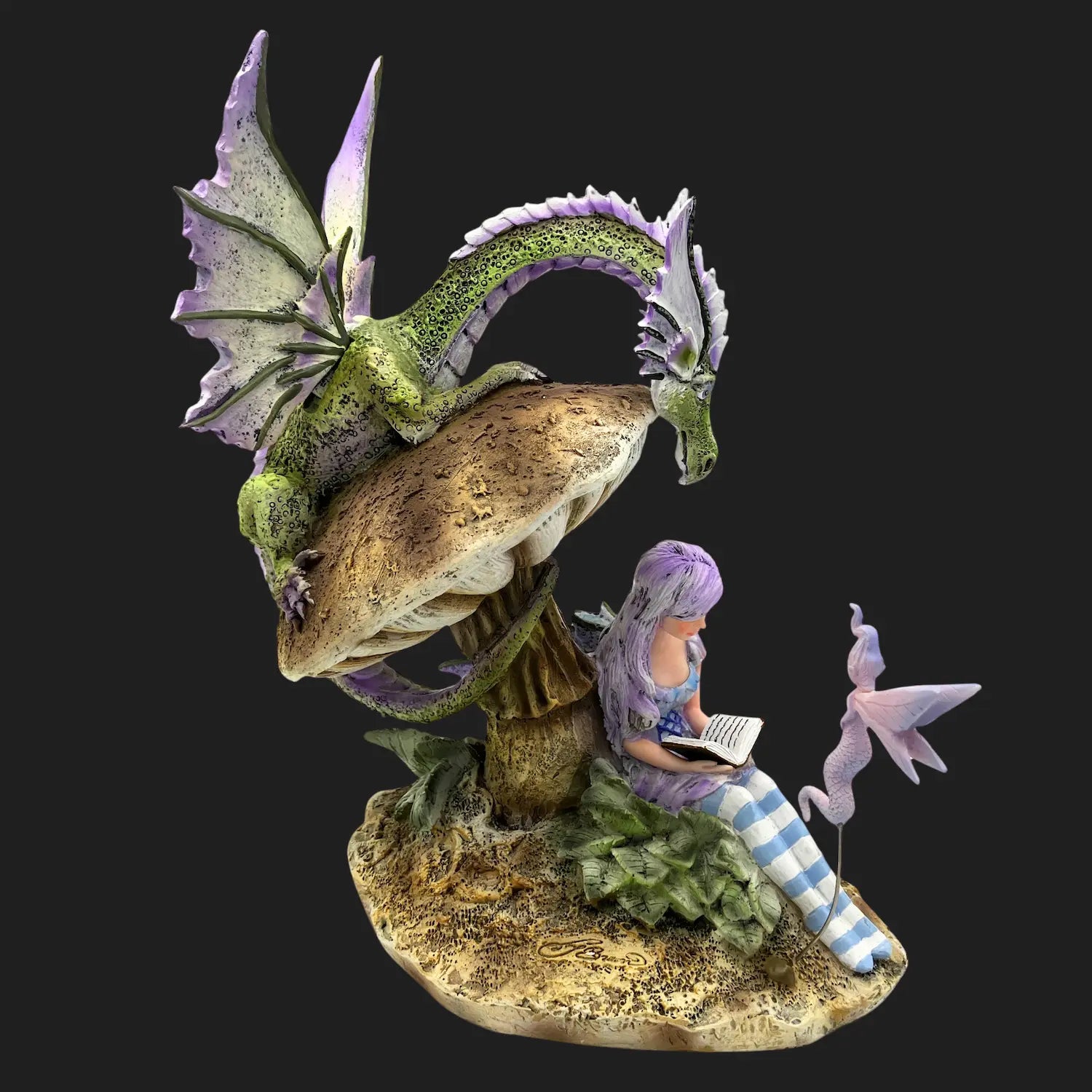 Back angle of the Storykeeper fairy with a green dragon on a mushroom, highlighting the detailed wings and fantasy design