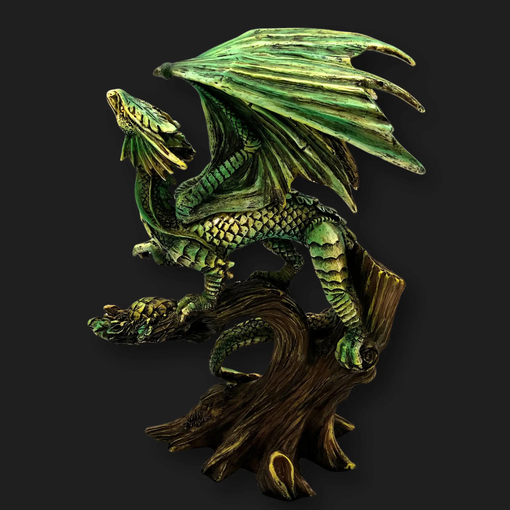 Back view of 10.5” Tree Dragon Figurine showing wings wrapped around weathered trunk