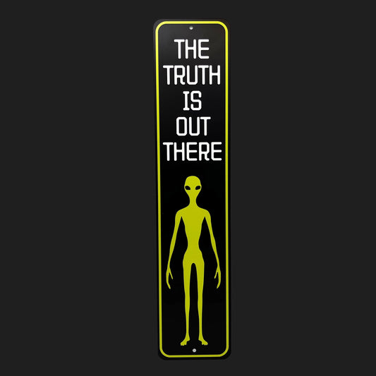 Alien figure with 'The Truth Is Out There' text on a black background