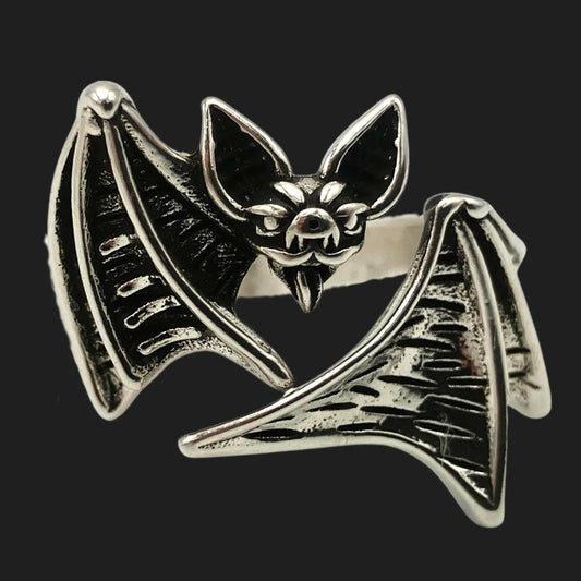Gothic vampire bat ring with fanged face and spread wings in silver-tone alloy