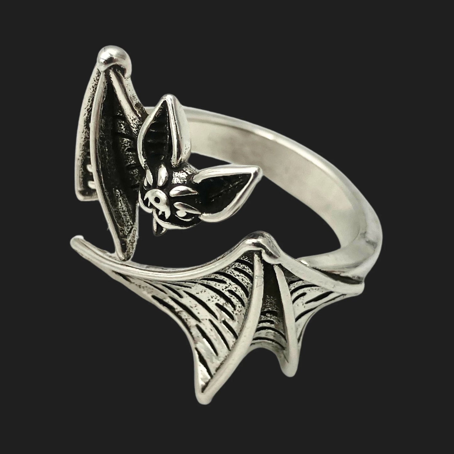 Side view of vampire bat ring with detailed wings wrapping around finger”

Do you want me to push this one more toward serious Gothic elegance (collector vibe) or campy vampire fun (Halloween-ready, tongue-in-cheek)?
