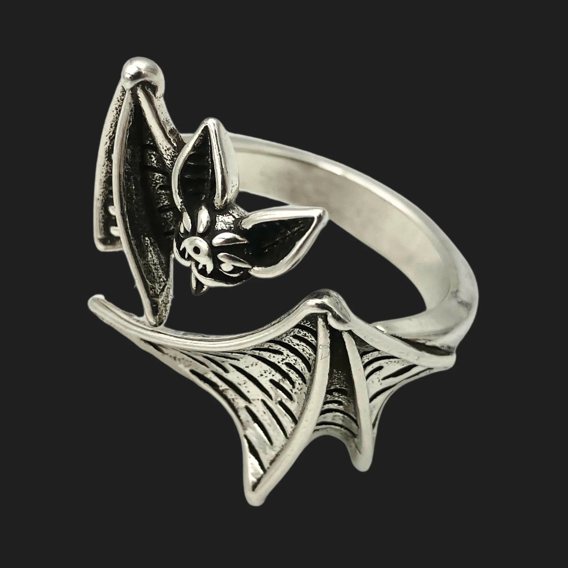 Side view of vampire bat ring with detailed wings wrapping around finger”

Do you want me to push this one more toward serious Gothic elegance (collector vibe) or campy vampire fun (Halloween-ready, tongue-in-cheek)?