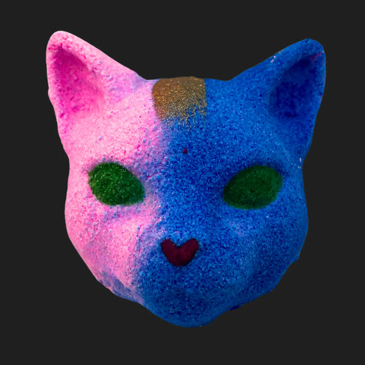 Blue and pink cat face bath bomb with green eyes and heart-shaped nose